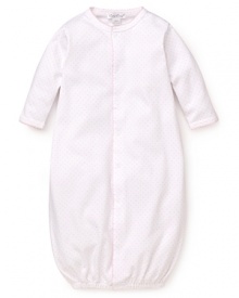 Gathered at the hem to keep their tiny feet cozy and safe, this super soft cotton gown converts to a cocoon for seamless play-to-nap transitions.