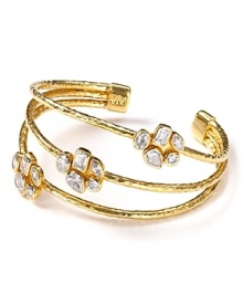 Don't settle just one crystal: opt for Melinda Maria's crystal cluster cuff. Flaunting hammered gold, the multi-stone style commands attention from cocktail hour to fabulous fêtes.