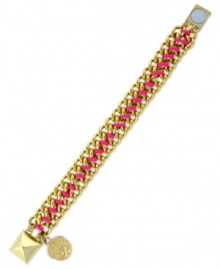 Wrap your wrists in colorful chic. Vince Camuto's chain bracelet flaunts a bright pink cord intertwined in the links. Finished with a pyramid stud magnetic closure. Crafted in gold tone mixed metal. Approximate length: 8 inches.