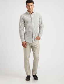 Crisp woven cotton, tailored in a classic style and patterned with sharp vertical stripes.Button-down shirt collarButton placketPatch pocketLong sleeves with button cuffsBack yoke with inverted back pleatCottonMachine washMade in Italy