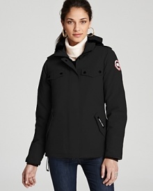 In a classic silhouette, Canada Goose's Burnett jacket lends essential warmth with a white duck down fill and a Polartec Powershield hood.