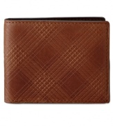 Fossil's must-have Albright traveler features rich leather and a unique plaid detailing.