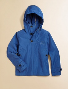 This packable, casual, lightweight layer with attached hood is sure to keep your child warm and dry.Attached hoodLong sleeves with button cuffsZip-front with buttoned bibFront patch pockets with button closurePolyesterMachine washImported Please note: Number of buttons may vary depending on size ordered. 