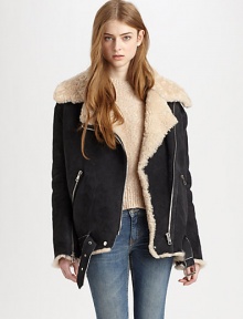 Concluded by a buckled hem and plethora of asymmetrical zippers, this leather topper has plush shearling trim and lining. Notched shearling collarAsymmetrical zipper and snap closuresLong sleeves with zippered cuffsZippered slash pocketsAdjustable buckle at hemAbout 31 from shoulder to hemLambskin leather with shearling trim and liningFur origin: UruguayDry clean with fur specialistImportedModel shown is 5'10 (177cm) wearing US size 4.