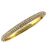 Sleek and chic. This thin hinged bracelet from Vince Camuto is crafted from gold-tone mixed metal with glass crystal pave accents adding luster. Approximate diameter: 2-1/2 inches.