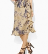 Skirt Hand-painted with a large floral pattern, Lauren by Ralph Lauren's flowing silk skirt is crafted in a ruffled sarong silhouette.