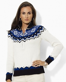 A classic Fair Isle pattern and cozy mockneck collar create an elegant heritage quality on the Terisa half-zip sweater, rendered in a soft cotton blend.