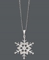 Let it snow, let it snow, let it snow! This intricate cut-out pendant features a beautiful snowflake dusted by round-cut diamonds (1/10 ct. t.w.). Crafted in sterling silver. Approximate length: 18 inches. Approximate drop: 1-2/10 inches.