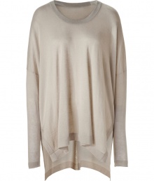 Sumptuously soft and effortlessly elegant, Donna Karans pure beige cashmere knit top epitomizes understated luxury - On trend, boxy cut with chic drape detail and pointed hem - Long, fitted sleeves and flattering round neck - Vents at sides, hem hangs longer in the back - A versatile compliment to any wardrobe perfect for pairing with leather leggings, skinny denim and pencil skirts