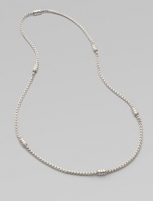 A intricately woven piece accented periodically with oblong station beads. Sterling silver Length, about 24 Imported 