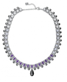 Drops of purple crystals add a magnificent touch to Swarovski's statement necklace. With a Swarovski exclusive cut, the center pendant captivates in Purple Velvet. Crafted in rhodium-plated mixed metal. Approximate length: 16 inches + 2-1/2-inch extender.