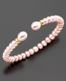 The perfect romantic accent to your lovely look; this bracelet features beautiful pink cultured freshwater pearls (6-9 mm) set in 14k gold. Approximate diameter: 2 inches. Approximate length: 7 inches.