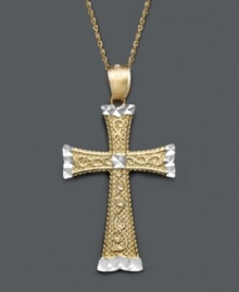 A versatile two tone cross pendant in design to last a lifetime. Crafted in 14k gold and 14k white gold, cross features an engraved scroll pattern and diamond-cut accents. Approximate length: 18 inches. Approximate drop width: 1 inch. Approximate drop length: 1-1/2 inches.