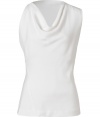 Lend a contemporary edge to polished day and evening looks alike with Donna Karans pristine white sculptural top - Draped neckline, asymmetrical sleeveless top - Form-fitting - Wear with a bright skirt, a blazer and pin heels