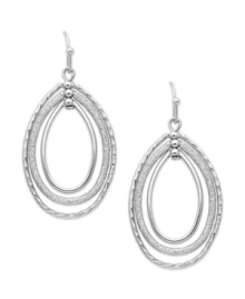 Fashion that pulls you in. These orbital earrings from Charter Club feature an oval silhouette with dangling hoops. Crafted in silver tone mixed metal. Approximate drop: 1-3/4 inches.