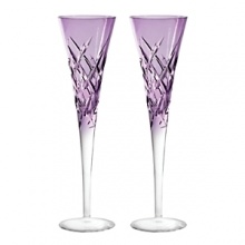 Featuring an updated version of the popular Duchesse pattern. Elegant toasting flute pair in cased, color crystal. Produced in full lead crystal and designed by Vera Wang.