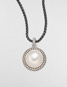 From the Mooonlight Ice Collection. A lustrous white mabe pearl sits center with a dazzling, two-row diamond surround. White mabe pearlDiamonds, 1.36 tcwBlackened sterling silverSize, about ½Imported Please note: Chain sold separately.