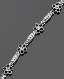 Give your style a boost with this cheerful flower bracelet featuring sparkling diamond accents. Victoria Townsend design crafted in sterling silver. Approximate length: 7 inches.