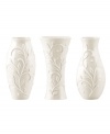 Spread elegance throughout your home with Opal Innocence Carved vases, featuring classic silhouettes with an embossed vine motif in shiny white porcelain. A pretty showcase for a couple of blooms. Qualifies for Rebate