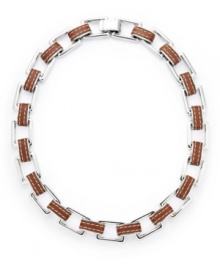 Industrial chic. This eclectic necklace from the Lauren by Ralph Lauren collection features heavy rectangular links in concert with a trendy leather band. Set in silver tone mixed metal. Approximate length: 18 inches.