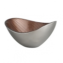 Reflecting the colors of southwest landscape, this classic Nambé design incorporates a new enamel finish. The ripple like design, mirroring the alluring lines found in sand and stone alike, is hand applied to each bowl, making each piece one of a kind.