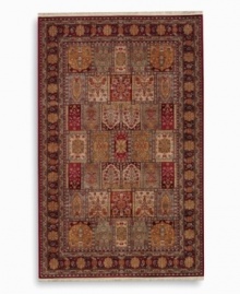 This long runner is ideal for hallways and entryways. A striking example of classic Bakhtiyari designs, this rug features organic motifs in a panel design of reds, greens and golds, finished with a rosette border. A special antique wash enhances and harmonizes the burnished colors to create a rich vintage finish. Woven in the USA of luxuriously soft premium worsted New Zealand wool.