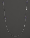 Diamonds and dark amethysts dot a sterling silver chain. By Ippolita.