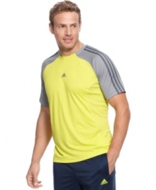 Slip into the zone with an adidas performance shirt designed with ClimaCool for ventilation and moisture management.