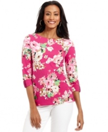 Feminine florals bloom on Charter Club's crisp top. It looks thoroughly modern with skinny jeans in winter white.