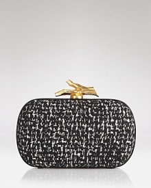 This smart, DIANE von FURSTENBERG tweed clutch is a study in understated after-hours accessorizing.