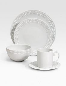 An elegantly detailed cereal bowl is made entirely by hand in fine Limoges porcelain with a raised pearl border. From the Perlee White Collection Porcelain 3H X 5½ diam. Dishwasher safe Imported 