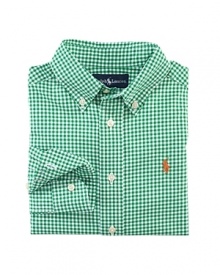 A handsome long-sleeved sport shirt is rendered in crisp gingham woven cotton broadcloth.