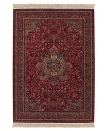 With regal designs that pay homage to the ancient art of rug-making, this piece imparts a classic, yet modern feel with rich colors that reflect the most popular looks of today. Featuring a dramatic center medallion, sweeping out in a burst of branches and blossoms, and accented in deep tones of antique red. Meticulous power-loom construction with Couristan's patented locked-in-weave and crystal-point finish. 25-year limited warranty.