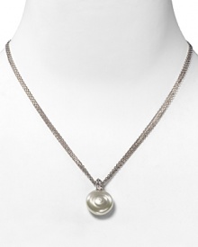 Centered on a beautiful coin pearl, this pendant necklace features a triple stainless steel chain. Designed by Majorica.