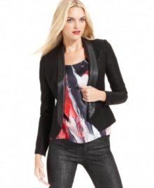 A classic black blazer gets edged up with tuxedo styling and a faux-leather shawl lapel in this DKNY Jeans look.