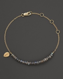 Labradorite sparkles on this delicate yellow gold bracelet from Meira T.