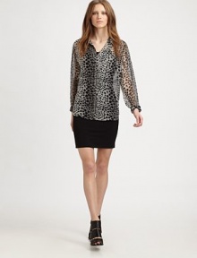 Semi-sheer silk top in a lavish leopard print with a single front patch pocket and length that hits below the hips. Point collarButton frontSingle front patch pocketLong sleevesButtoned cuffsLonger length hits below the hipsSilkDry cleanImportedModel shown is 5'10 (177cm) wearing US size Small.