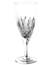 Crystal couture. Monique Lhuillier's Ellypse iced beverage glass balances a minimalist stem with a pattern of intersecting cuts and rounded scoops in sumptuous Waterford crystal.