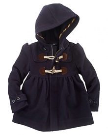 The preppy coat exudes timeless heritage style in a hooded silhouette and is finished with classic toggle closures.