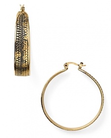 Be a global goddess with these golden hoop earrings from RJ Graziano. The shape is perfectly simple, while a touch of tribal-inspired texture gives this pair added glamor.