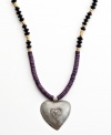 Show heart. Strung with wooden beads and a hand-cut and hammered pendant, this Heart of Haiti necklace is crafted by a co-op that supports women's employment in local communities.