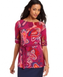 A pretty paisley print and a dainty ribbon belt create a charming effect on this petite tunic from Charter Club.