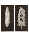 Standout wall art. Two polished aluminum leaves spring from ebony-stained panels, adding brilliant dimension and natural allure beside a table or above the bed.