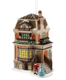 Draped with holly and dusted with snow, this elaborate Victorian building is home to Scrooge's nephew, Fred Holiwell, from A Christmas Carol. Hang it in your tree or group with other Dickens Village miniatures from Department 56.