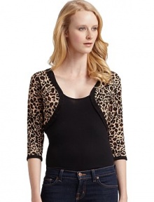 THE LOOKAllover leopard printRibbed knit trimOpen frontThree-quarter length sleevesTHE FITAbout 13 from shoulder to hemTHE MATERIAL80% viscose/20% nylonCARE & ORIGINDry cleanImportedModel shown is 5'10 (177cm) wearing US size Small. 