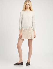 Light and soft in a luxurious heathery yarn from Italy, this effortless pullover gets added character from waist cutouts and subtle gathering.Ribbed roundneckLong sleeves with ribbed cuffsWide ribbed waist with front-to-back cutouts50% nylon/40% alpaca/10% mohairDry cleanImported of Italian fabricModel shown is 5'10 (177cm) wearing US size Small.This style runs small. We recommend ordering one size up for a standard fit. 