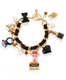 Don't leave home without your lipstick. Or your ring. Or your chihuahua. Betsey Johnson makes sure you have everything in this bracelet, crafted from gold-tone mixed metal and black ribbon, and featuring all the charming necessities. Approximate length: 7-1/2 inches.