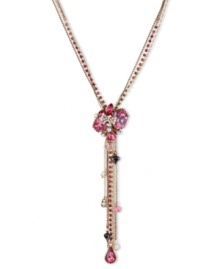 This Y-shaped necklace from Betsey Johnson is a colorful creation that flaunts fuchsia-colored crystal gem clusters, glass pearl bow accents, multi-chains with faceted beads, hematite tone bubble hearts and fuchsia-colored crystal teardrop. Crafted in antiqued gold tone mixed metal. Approximate length: 16 inches + 3-inch extender. Approximate drop: 5-1/4 inches.