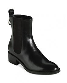 These Chelsea-style Cole Haan booties feature oversized pull tabs and stretch sides that make this waterproof design easy to pull on. They're rain boots, incognito-perfect for work.