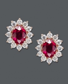 Add a little life to your look in red-hot hues. Effy Collection's oval-cut ruby (3-3/4 ct. t.w.) and round-cut diamond (1-5/8 ct. t.w.) earrings gleam in a 14k gold setting. Approximate length: 11/16 inch. Approximate width: 1/2 inch.